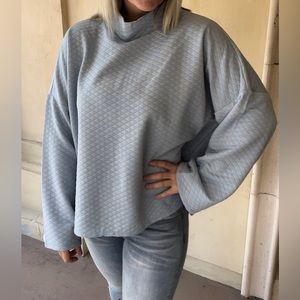 Quilted style baby blue top